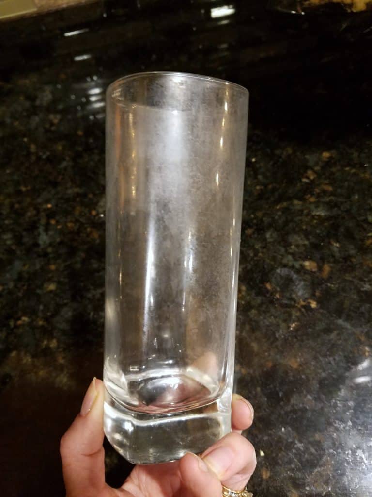hand holding a Cloudy Glass