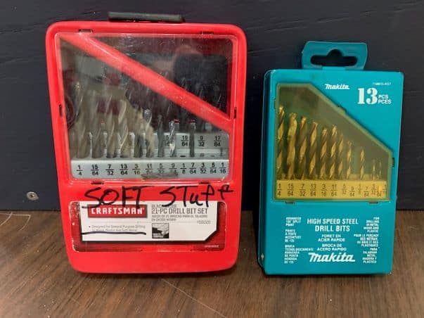 two drill bit sets side by side. one mark for wood use